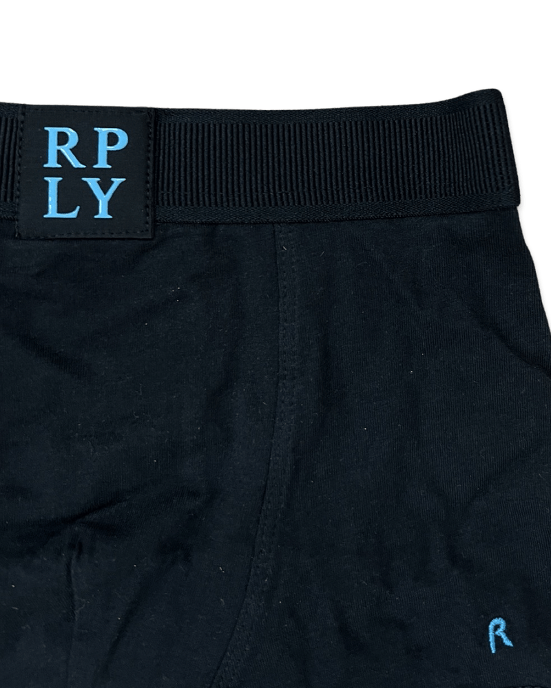 שלישיית בוקסרים לבנים